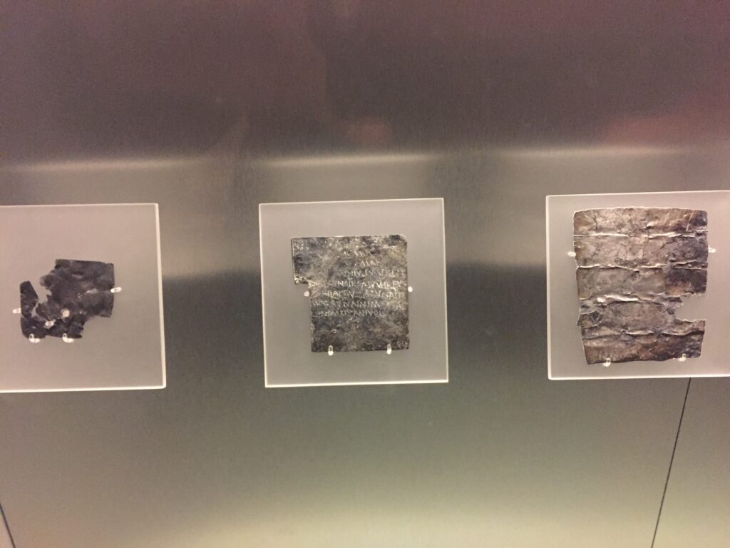 Curse tablets displayed at The Roman baths in Bath England