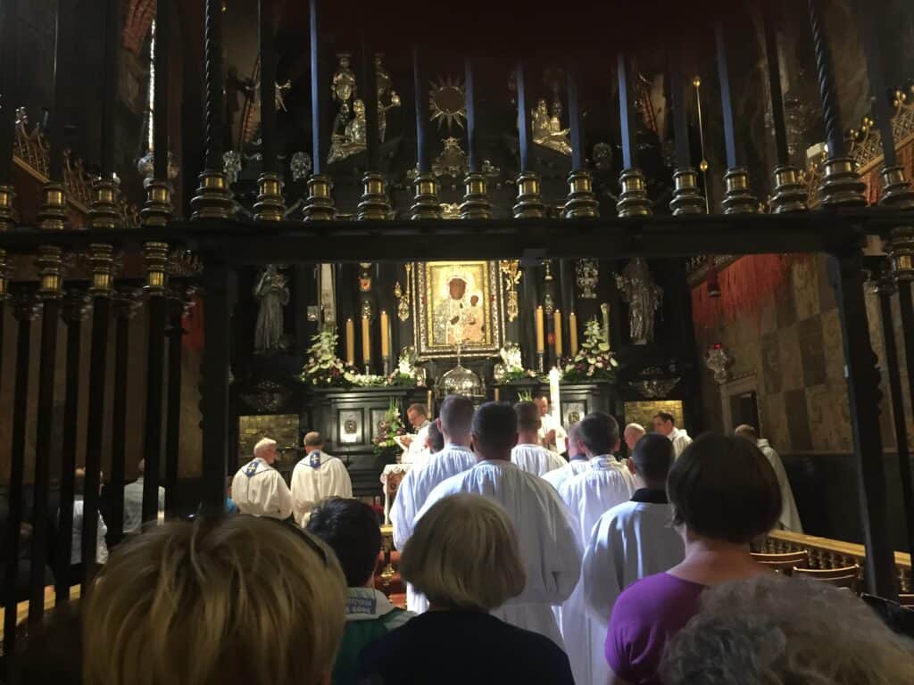 Viewing the icon of the Black Madonna in Jasna Gora Monastery in Czestochowa Poland - photo by www.theplaceswherewego.com